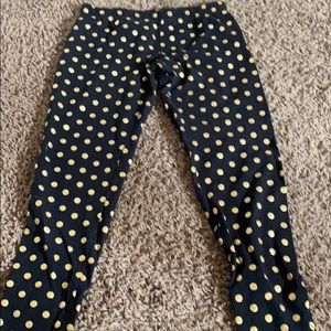 Black and gold polka dot leggings